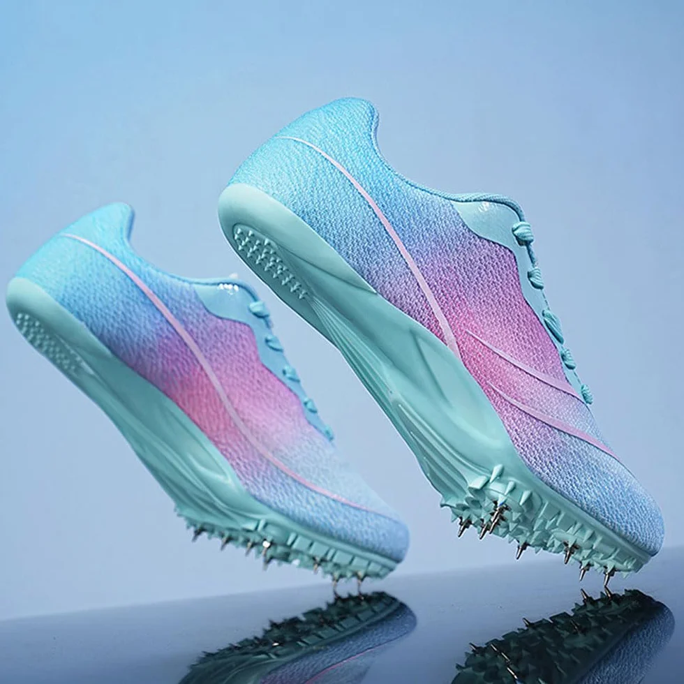 Sportowe buty do biegania Kolce Buty Męskie Damskie oddychające 8 Nails Lekkoatletyka Trampki antypoślizgowe Buty treningowe Sprint Wyścigi na torze Kolce Jump Sneaker Profesjonalne konkursowe,35-45EU