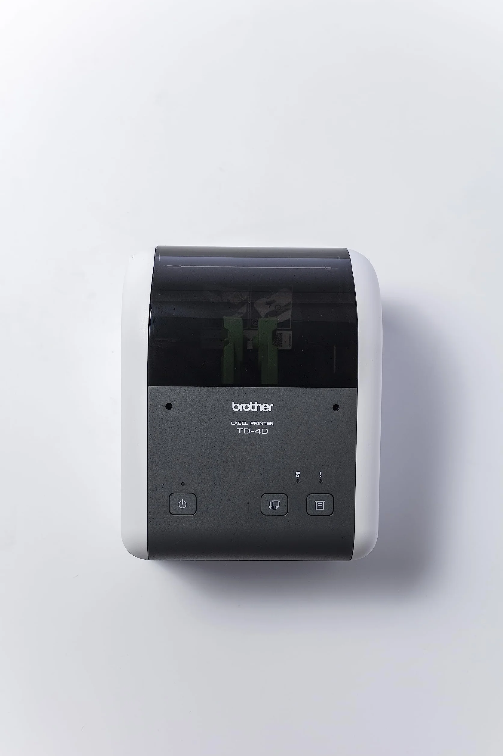 Brother TD-4210D drukarka etykiet, prędkość druku 203 dpi i 127 mm/s. Szerokość druku 104 mm, port USB i szeregowy