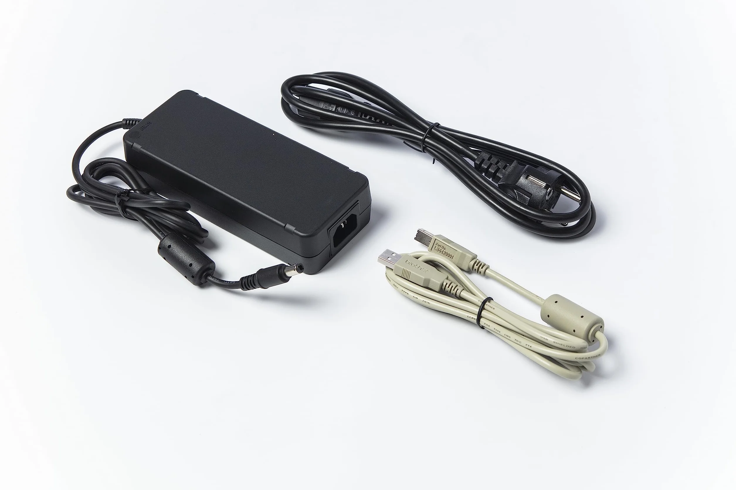 Brother TD-4210D drukarka etykiet, prędkość druku 203 dpi i 127 mm/s. Szerokość druku 104 mm, port USB i szeregowy
