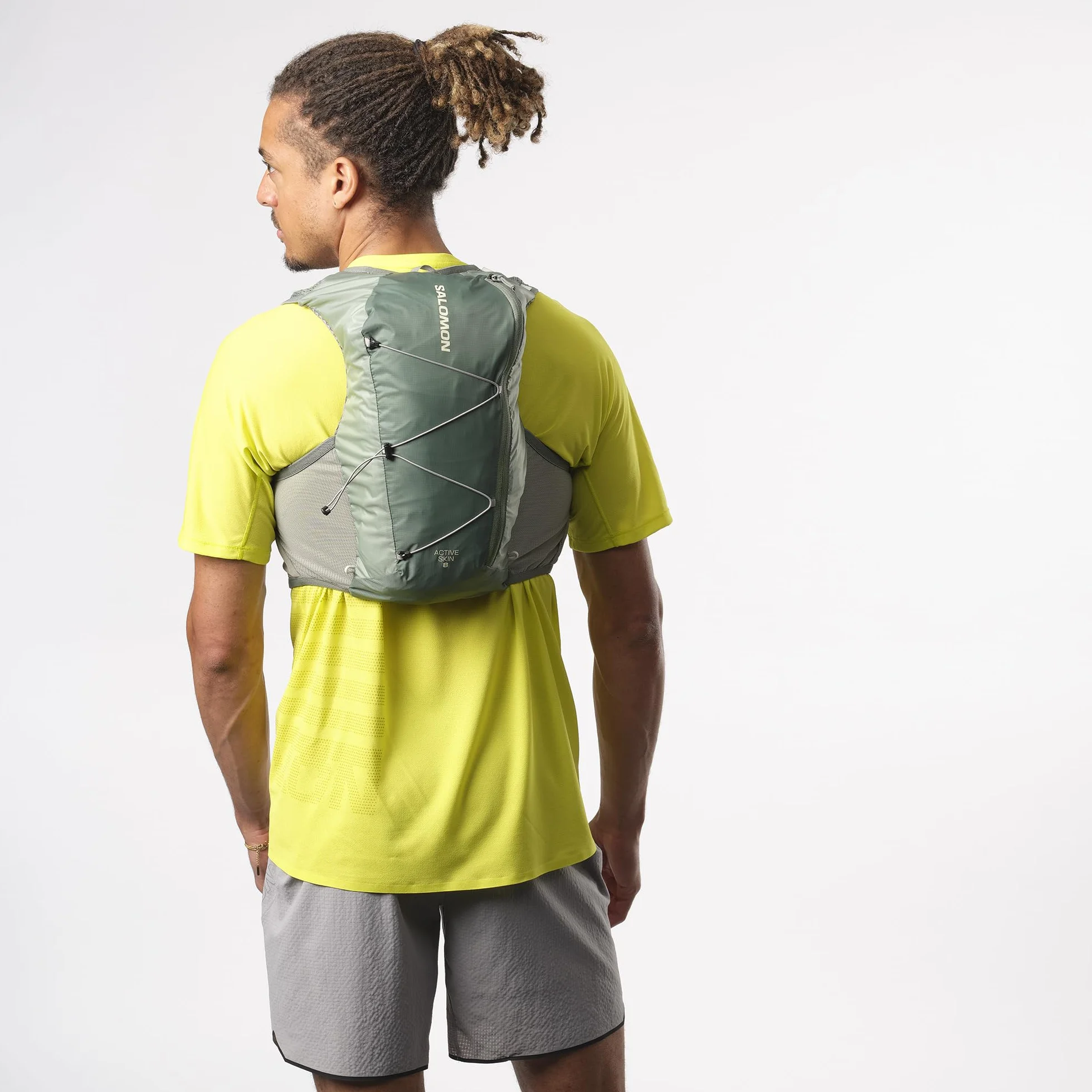 Salomon Active Skin 8 Unisex kamizelka nawadniająca do biegania szlak turystyczny z butelkami w zestawie, łatwe nawodnienie, precyzyjne dopasowanie 8 l i zoptymalizowane przechowywanie, zielona, XL