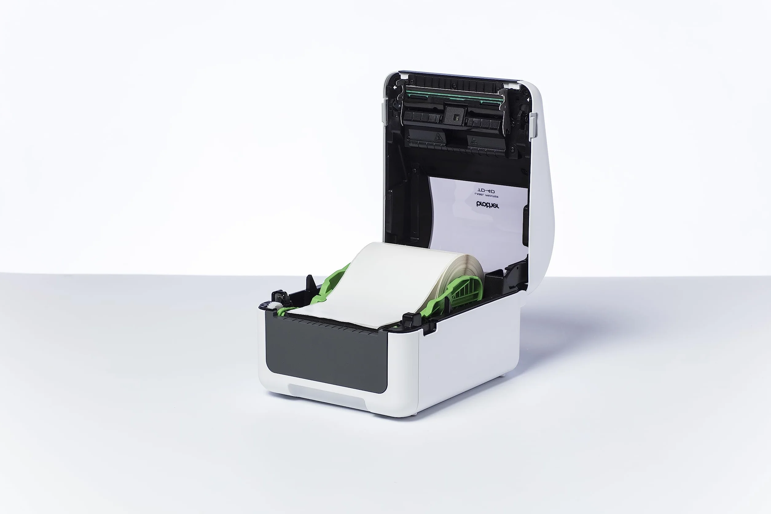 Brother TD-4210D drukarka etykiet, prędkość druku 203 dpi i 127 mm/s. Szerokość druku 104 mm, port USB i szeregowy