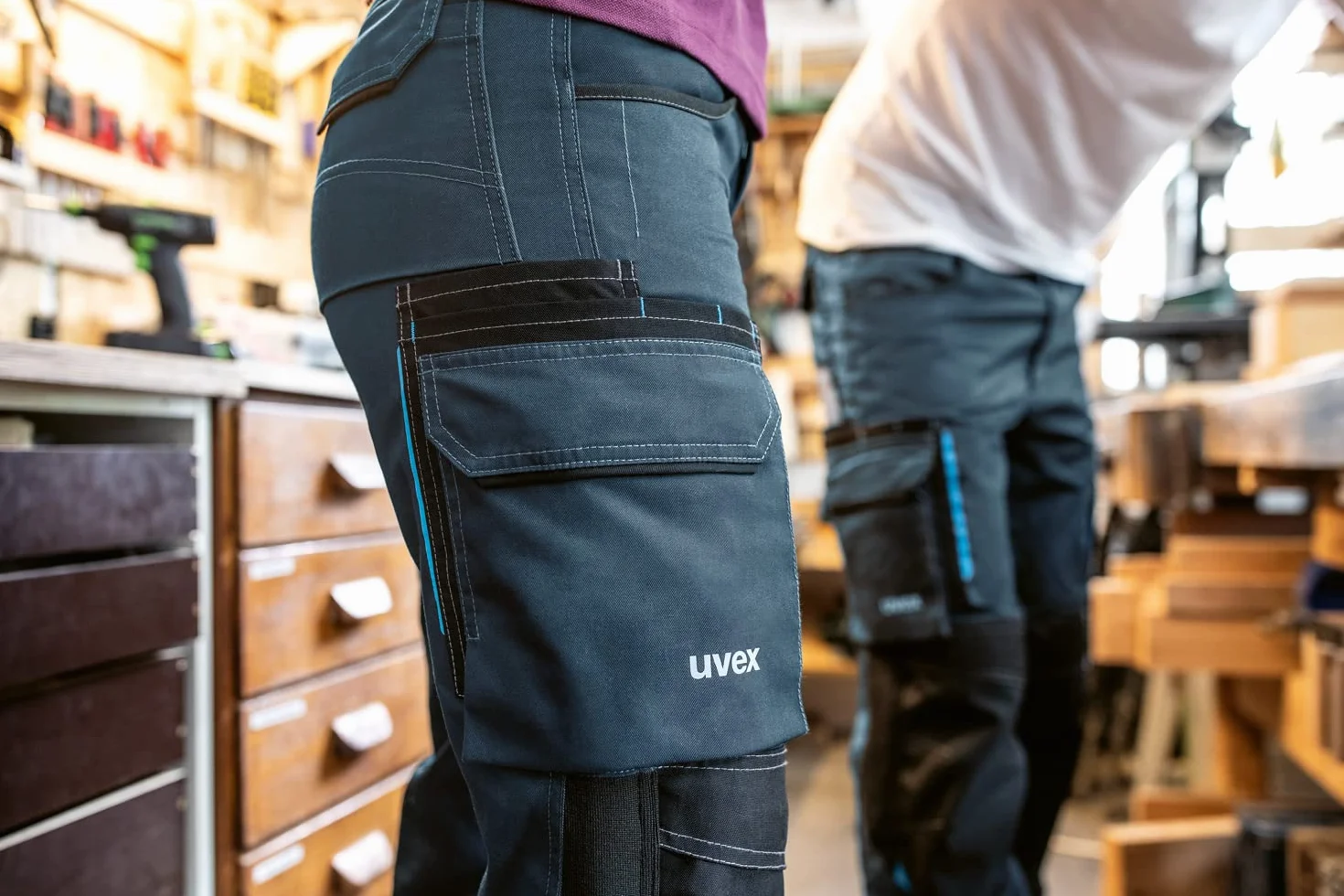 Uvex Tune-up Długie damskie spodnie robocze z kieszeniami na kolanach